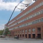 HighLine Crane Lifting Materials onto Roof of Building